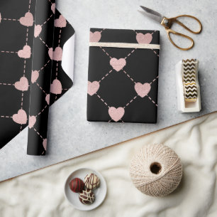 Rosa und schwarzes Herzmuster Geschenkpapier