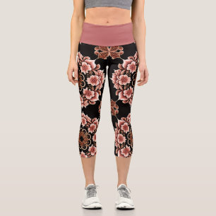 Rosa und schwarzes östliches Design Capri Leggings