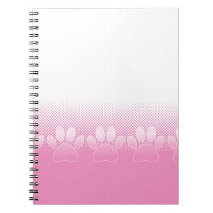 Rosa und weiße Pfeifen mit Zeitungspapier-Hintergr Notizblock