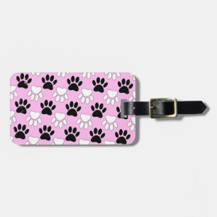 Rosa Untergrund: erschütterte schwarz-weiße Paws Gepäckanhänger