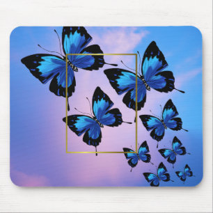 Rosa Wolken und blaue Schmetterlinge Mousepad