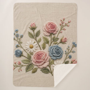 Rosarot und blau bestickte Rosen Sherpadecke