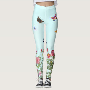 Rose Garden mit Schmetterlingen auf blauem Hinterg Leggings