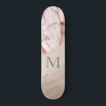 Rose Gold Rosa Marmor Wood Girly Chic Monogram Skateboard<br><div class="desc">Die Präsentation unserer Rose Gold Pink Marble Wood Girly Chic Monogram Skateboard - eine inspirierte Kreation, die das Wesen der Skater Mädchen überall einfangen soll. Dieses personalisierte Skateboard vereint Eleganz und Verspieltheit. Freuen Sie sich auf eine wunderschöne goldene Rose, eine rosa Marmorstruktur und Holzakzente. Das Hinzufügen eines Monogramms fügt eine...</div>