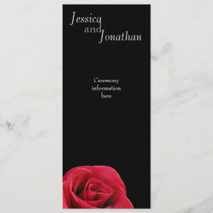 Rose rouge sur carte noire