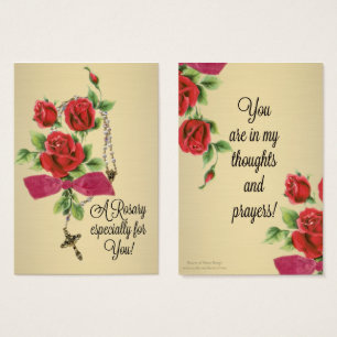 Rosenbeet-rotes rosa Rosen-Kruzifix-Gebet