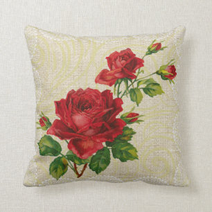 Roses rouges et coussin vintage floral de dentelle