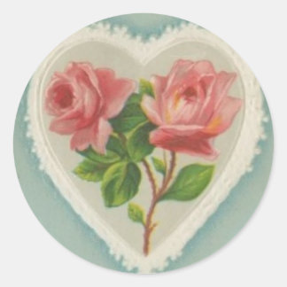 Roses victoriens doux dans un autocollant de coeur