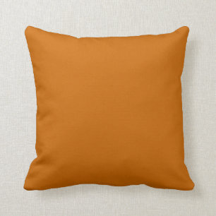 Rostbraun-orangefarbenes Kissen