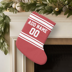 Rot trägt Jersey mit Ihrem Namen und Zahl zur Großer Weihnachtsstrumpf