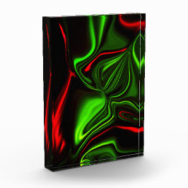 Rot und grün gebogene Linien auf dunklem Hintergru Fotoblock