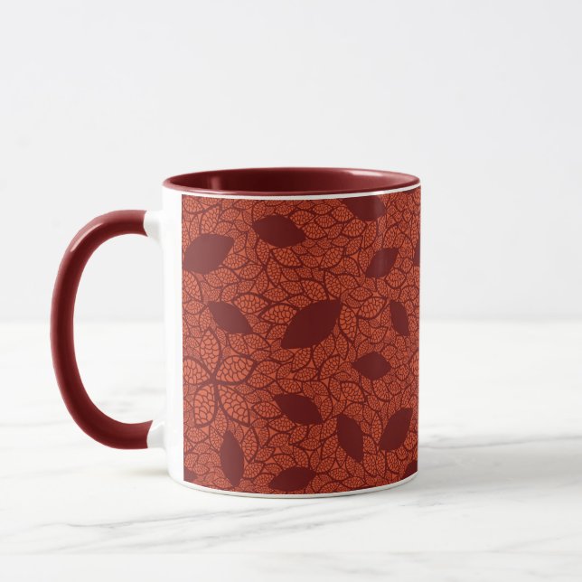Rot verlässt Muster auf Orange Tasse (Links)