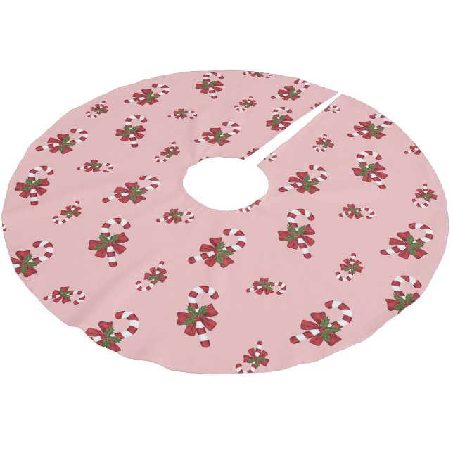 Rot-weiße Weihnachtscreme-Muster auf rosa Polyester Weihnachtsbaumdecke (Schrägansicht)