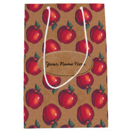 Rote Äpfel auf Brown-Papier Mittlere Geschenktüte