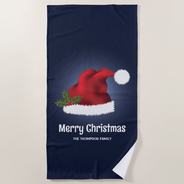 Rote festliche Weihnachtsmannmütze auf Blau mit be Strandtuch (Vorderseite)