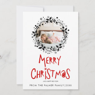 Rote Frohe Weihnachten-Typografie schwarzer Kranz  Feiertagskarte