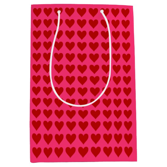 Rote Herzen auf Rosa Mittlere Geschenktüte (Vorderseite)