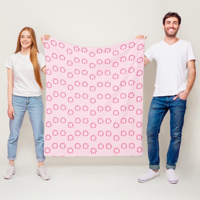 rote Herzkreise auf rosa Fleecedecke (Beispiel)
