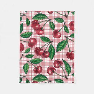 Rote Kirschen auf rosa Gingham Fleecedecke