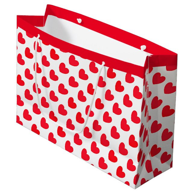 Rote Liebe Herzmuster auf Weiß Große Geschenktüte (Vorderseite Schrägansicht)