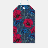 Rote Mohnblumen und blaue Maisblumen auf blau