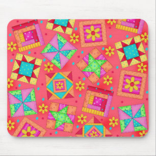 Rote Patchwork-Steppdecke blockiert Mousepad