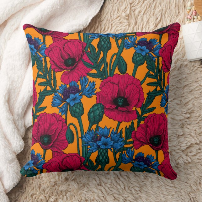 Rote Pfeffer und blaue Kornblumen auf Orange Kissen (Decke)
