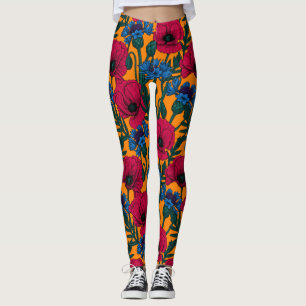 Rote Pfeffer und blaue Kornblumen auf Orange Leggings