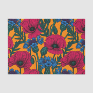Rote Pfeffer und blaue Kornblumen auf Orange Seidenpapier