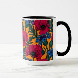 Rote Pfeffer und blaue Kornblumen auf Orange Tasse