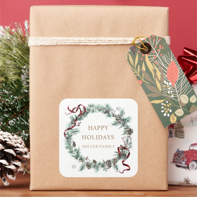 Rote Ribbon Winter Greenery Monogram Quadratischer Aufkleber (Feiertag)