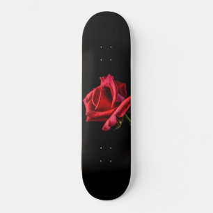 Rote Rose gegen schwarzen Hintergrund Skateboard