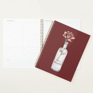 Rote Rose in Flasche Planer