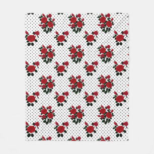 Rote Rosen auf einem Polka Dot Hintergrund. Fleecedecke
