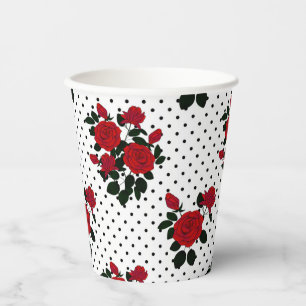 Rote Rosen auf einem Polka Dot Hintergrund. Pappbecher