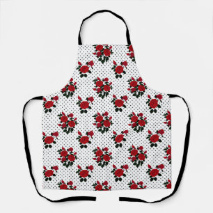 Rote Rosen auf einem Polka Dot Hintergrund. Schürze