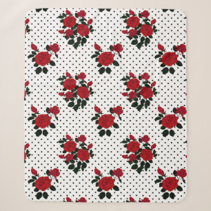 Rote Rosen auf einem Polka Dot Hintergrund. Sherpadecke