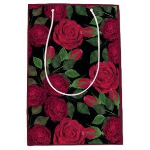 Rote Rosen auf schwarz. Mittlere Geschenktüte