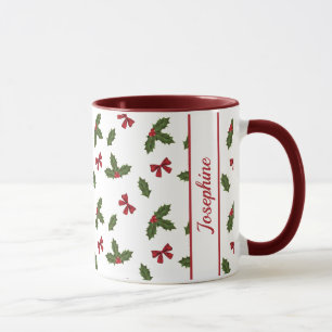 Rote Schleifen und Weihnachts-Stechpalmen-Pflanzen Tasse