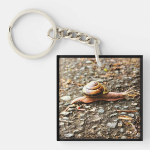 Rote Schnecke am Boden Schlüsselanhänger