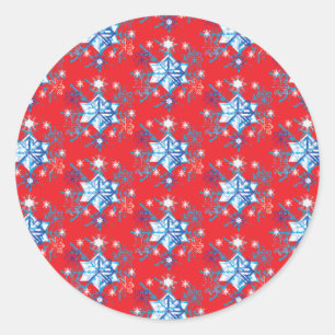Rote und blaue Schneeflocken und Sterne Runder Aufkleber