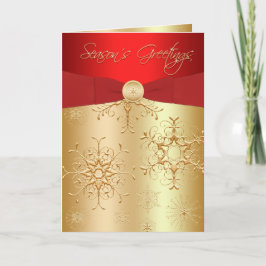 Rote und goldene Snowflakes Die Grüße Karte der Sa