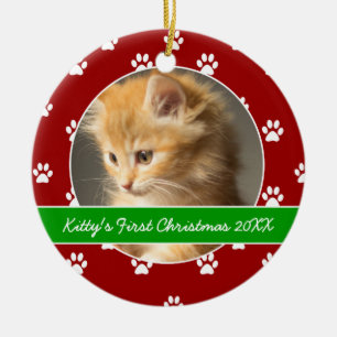 Rote und grüne Tatze druckt das erste Weihnachten Keramikornament