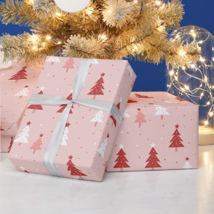 Rote und rosa Weihnachtsbäume im rosa Hintergrund Geschenkpapier