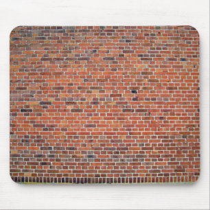 Rote und schwarze Backsteinmauer mit weißem Mörs Mousepad