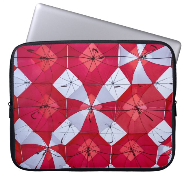 Rote und weiße offene Regenschirme Laptopschutzhülle (Vorderseite)