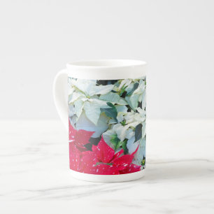 Rote und weiße Poinsettia-Blume Prozellantasse