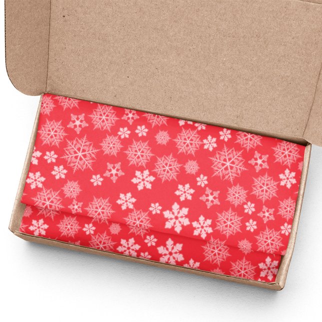 Rote und weiße Weihnachtsschneeflocken-Muster Seidenpapier (Red and white snowflake pattern tissue paper.)