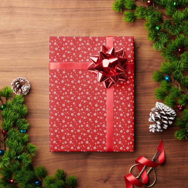 Rote und weiße Weihnachtsschneeflocken und Schneem Geschenkpapier (Feiertagsgeschenk)