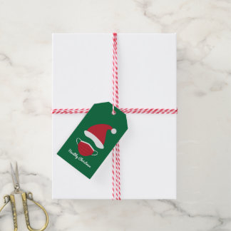 Rote Weihnachtsmannmütze und Gesichtsmaske Geschenkanhänger